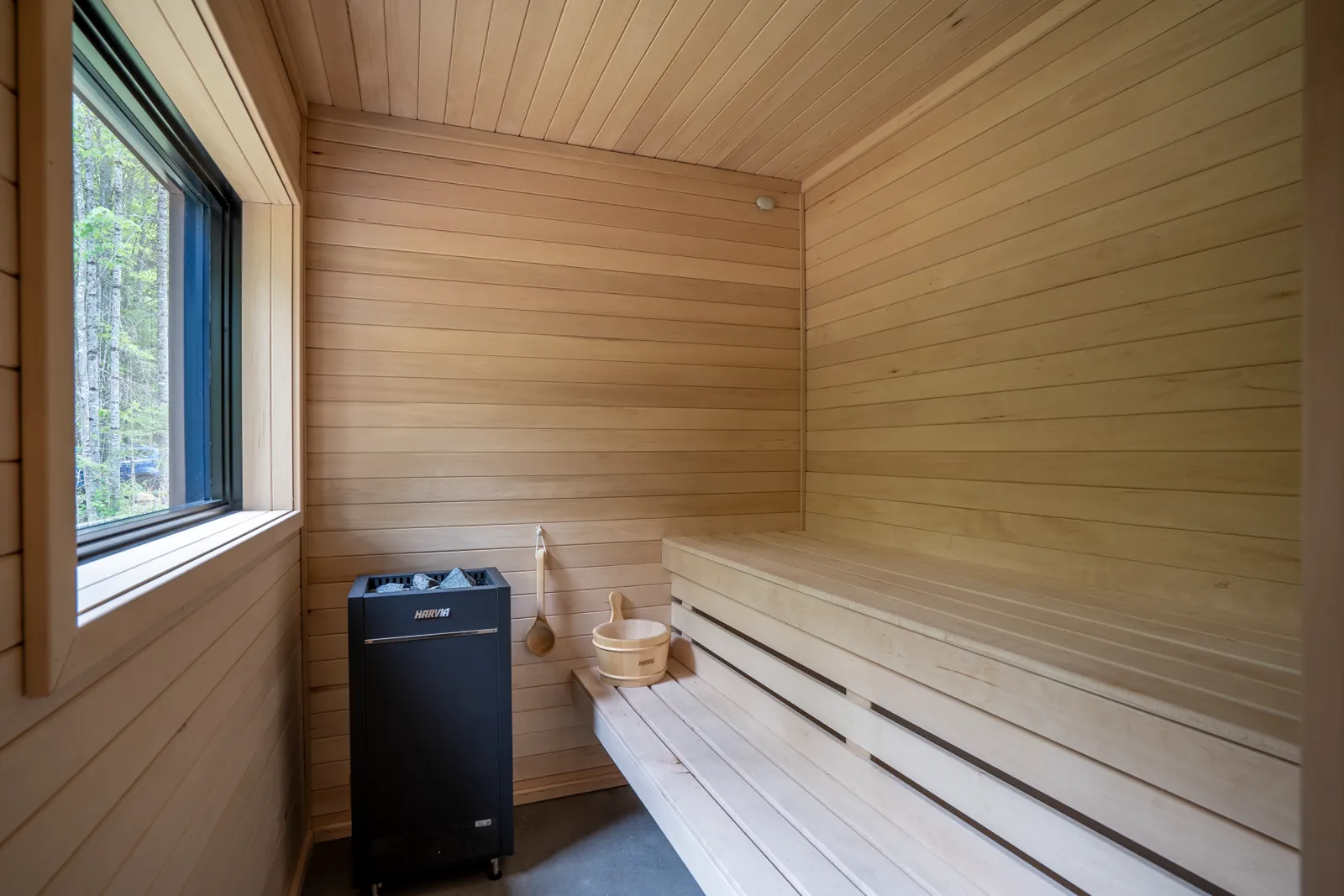 Sauna intérieur intégré à l'enveloppe thermique